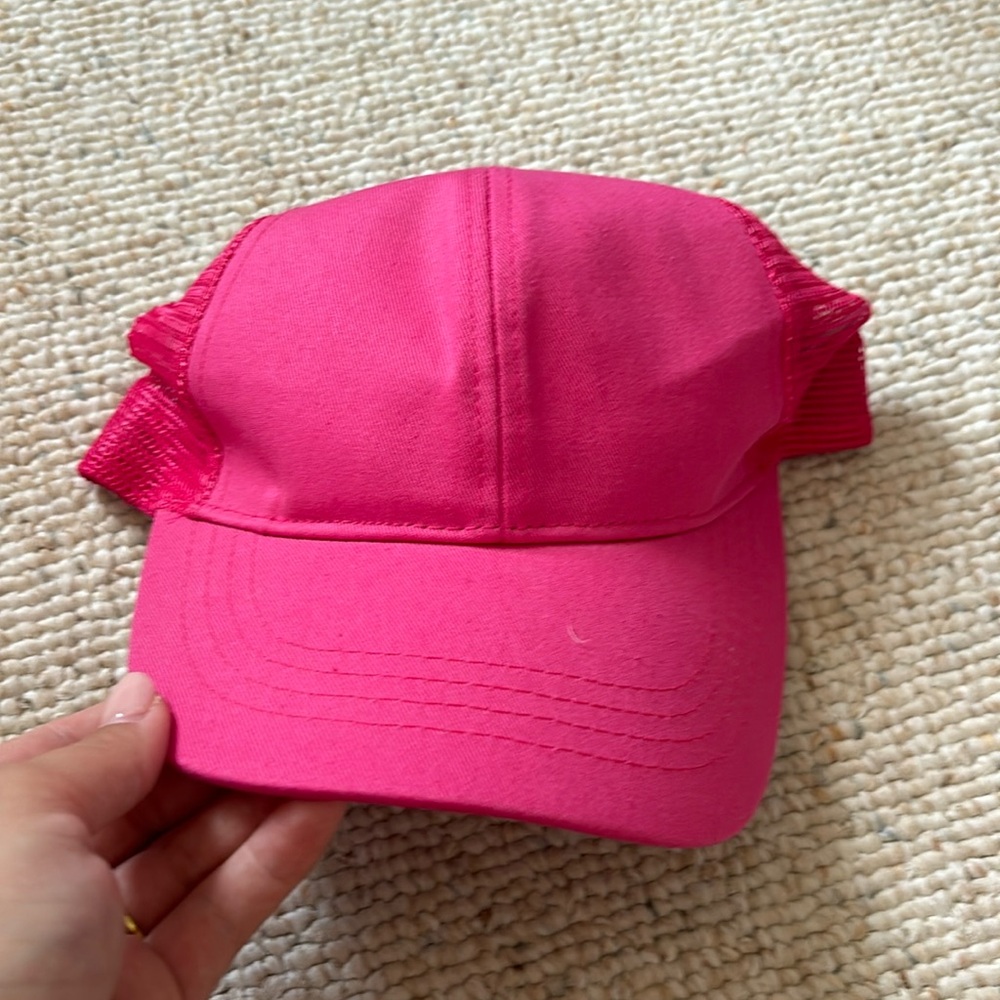 C.C Hot Pink hat with pony tail spot.